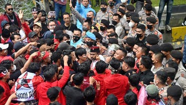 Students face police during a protest against recent gasoline price hike in Jakarta, Indonesia, on September 8, 2022. (AFP)