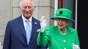 FILE PHOTO: Britain's Queen Elizabeth and Prince Charles stand on a balcony during the Platinum Jubilee Pageant, marking the end of the celebrations for the Platinum Jubilee of Britain's Queen Elizabeth, in London, Britain, June 5, 2022. REUTERS/Hannah McKay/Pool/File Photo
