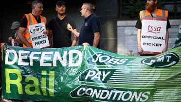Members of the National Union of Rail, Maritime and Transport Workers form a picket line while on strike, outside Euston railway station in London, Britain, August 20, 2022. (File photo: Reuters)