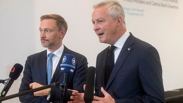 French Minister of the Economy and Finance Bruno Le Maire (R) and German Finance Minister Christian Lindner speak with journalists as they arrive for an informal meeting of EU Economy and Financial Affairs Ministers and Central Bank Governors on September 9, 2022 in Prague, Czech Republic. (AFP)