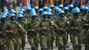 Ivorian soldiers of the UN peacekeeping mission in Mali MINUSMA (United Nations Multidimensional Integrated Stabilisation Mission in Mali) parade as they take part in the celebrations marking the 59th anniversary of Ivory Coast's independence from France, on August 7, 2019 in Abidjan. / AFP / SIA KAMBOU
