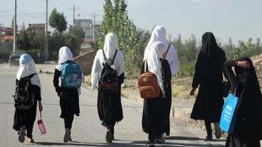 Girls walk to their school along a road in Gardez, Paktia porvince, Afghanistan, on September 8, 2022. (AFP)