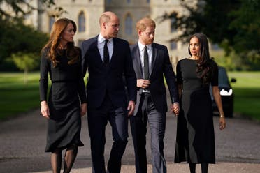 William and Harry with their wives on Saturday (AFP)