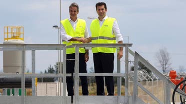 Greek Prime Minister Kyriakos Mitsotakis and his Bulgarian counterpart Kiril Petkov pose for a picture during the inauguration ceremony of the Interconnector Greece-Bulgaria (IGB) gas pipeline that will carry gas from Komotini to Stara Zagora in Bulgaria, in Komotini, Greece, on July 8, 2022. (Reuters)