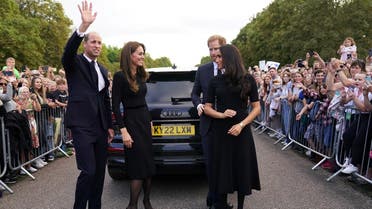 Britain’s William, Prince of Wales, Catherine, Princess of Wales, Britain’s Prince Harry and Meghan, the Duchess of Sussex, wave to members of the public at Windsor Castle, following the passing of Britain's Queen Elizabeth, in Windsor, Britain, on September 10, 2022. (Reuters) 
