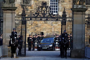 The hearse carrying the coffin of Britain's Queen Elizabeth departs Holyrood Palace, in Edinburgh, Scotland, Britain, on September 12, 2022. (Reuters)