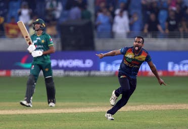 Sri Lanka’s Chamika Karunaratne celebrates after taking the wicket of Pakistan’s Haris Rauf to win the Asia Cup final at the Dubai International Stadium, Dubai, UAE, on  September 11, 2022. (Reuters)