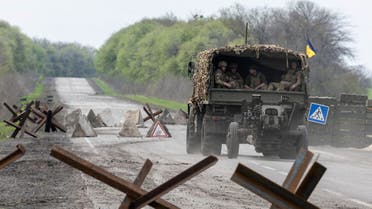 A Ukrainian military vehicle drives to the front line during a fight, amid Russia's invasion in Ukraine, near Izyum, Kharkiv region, Ukraine. (File photo: Reuters)