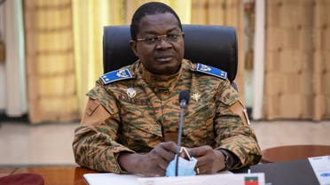 General Aimé Berthelemy Simporé, state minister in charge of Defense looks on at the first cabinet meeting of the newly appointed government in Ouagadougou, on March 7, 2022. (AFP)