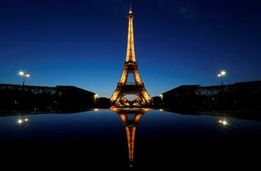 A night view shows the Eiffel tower, reflected in a car's roof, in Paris, France, April 30, 2016. (File Photo: Reuters)