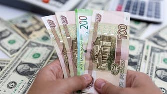 Russian ruble firms as country taps domestic market for first time since February