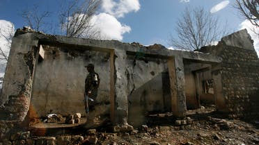 A Pakistani army soldier walks at a government school that was torched by militants last year, in Pakka village in Kurram Tribal Agency December 18, 2012. (File photo: Reuters)