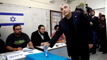 A file photo shows Yair Lapid, a co-leader of Blue and White party, casts his ballot as he votes in Israel's national election at a polling station in Tel Aviv, Israel March 2, 2020. (Reuters)