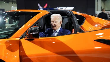 President Joe Biden sits in a Chevrolet Corvette Z06 during a visit to the Detroit Auto Show to highlight electric vehicle manufacturing in America, in Detroit, September 14, 2022. (Reuters)