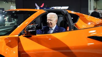 Biden hops into Corvette and declares Detroit is ‘back’ at EV-focused auto show