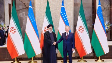 Uzbekistan's President Shavkat Mirziyoyev meets Iran's counterpart Ebrahim Raisi ahead of the Shanghai Cooperation Organization (SCO) summit in Samarkand, Uzbekistan, September 14, 2022. (Reuters) 