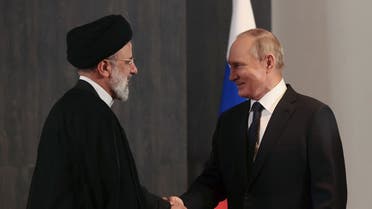 Russian President Vladimir Putin meets with his Iranian counterpart Ebrahim Raisi on the sidelines of the Shanghai Cooperation Organisation (SCO) leaders’ summit in Samarkand on September 15, 2022. (AFP)