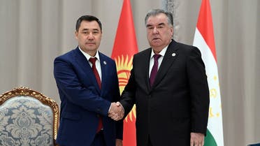 Kyrgyz President Sadyr Japarov shakes hands with Tajik President Emomali Rakhmon during a meeting on the sidelines of the Shanghai Cooperation Organization (SCO) summit in Samarkand, Uzbekistan, on September 16, 2022. (Reuters)