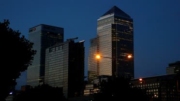 Office lights are on in banks as dawn breaks behind the financial district of Canary Wharf, in London, Britain June 24, 2016. (File photo: Reuters)