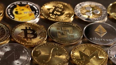 Representations of cryptocurrencies are seen in this illustration. (Reuters)