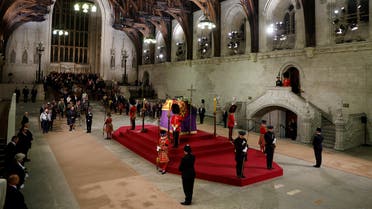 People observe a National moment of reflection in honour of the late Queen Elizabeth, the day before her funeral, at Westminster Hall, in London, Britain, September 18, 2022. (Reuters)