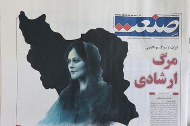 A newspaper with a cover picture of Mahsa Amini, a woman who died after being arrested by the Islamic Republic's morality police is seen in Tehran, Iran, on September 18, 2022. (Reuters)