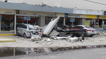 A view of vehicles damaged by the collapse of the facade of a department store during an earthquake in Manzanillo, Mexico September 19, 2022. (Reuters)
