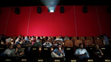 Jammu and Kashmir government officials watch Laal Singh Chaddha, a movie produced by and starring Aamir Khan, an official remake of the 1994 film Forrest Gump, inside a cinema hall run by India's leading multiplex chain Inox after its inauguration in Srinagar September 20, 2022. (Reuters)