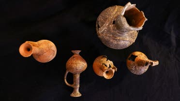 Vessels that contained opium in the 14th century BC, when it was used by Canaanites as an offering for the dead, according to a study by the Israel Antiquities Authority, Tel Aviv University and The Weizmann Institute of Science, are displayed in Jerusalem, September 20, 2022. (Reuters)