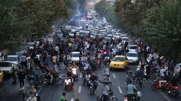 A picture obtained by AFP outside Iran on September 21, 2022, shows Iranian demonstrators taking to the streets of the capital Tehran during a protest for Mahsa Amini, days after she died in police custody. (AFP)A picture obtained by AFP outside Iran on September 21, 2022, shows Iranian demonstrators taking to the streets of the capital Tehran during a protest for Mahsa Amini, days after she died in police custody. (AFP)