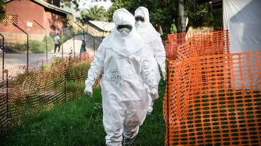 Medical staff of the Ebola Treatment Unit (ETU) work in Personal Protective Equipment (PPE) during their weekly rehearsal at the Bwera General Hospital in Bwera bordering with DRC, western Uganda, on December 12, 2018. (AFP)