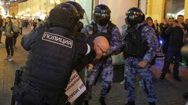 Russian police officers detain a participant during an unsanctioned rally, after opposition activists called for street protests against the mobilization of reservists ordered by President Vladimir Putin, in Moscow, Russia September 21, 2022. (Reuters)