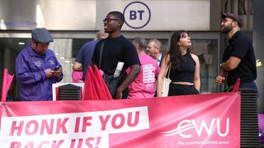 BT Group plc workers unionised with the CWU (Communication Workers Union) stand a picket line during a strike outside the BT Tower in London, Britain. (Reuters)