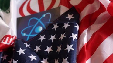 Atomic symbol and USA and Iranian flags are seen in this illustration taken September 8, 2022. (Reuters)