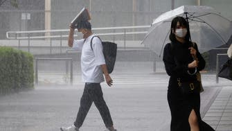 Six feared in torrential Japan rain                       