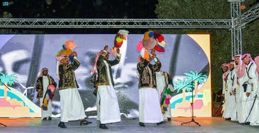 Musicians celebrate on stage. (SPA)