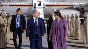 UAE Minister of Climate change and Environment, Maryam Al Muhairi welcomes German Chancellor Olaf Scholz at Abu Dhabi Airport, in Abu Dhabi, UAE September 24, 2022. (WAM)