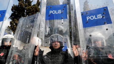 Police officers use their shields to prevent media members as they detain a group of protesters who attempted to defy a ban and march on Taksim Square to celebrate May Day, in Istanbul, Turkey May 1, 2022. (File photo: Reuters)
