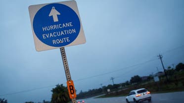 A hurricane evacuation route sign is displayed as Hurricane Ian spins toward the state carrying high winds, torrential rains and a powerful storm surge, in Punta Gorda, Florida, US September 27, 2022. (Reuters) 