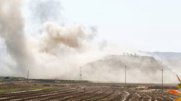 Smoke rises from the Iraqi Kurdistan headquarters of the Kurdistan Freedom Party (PAK), after Iran's Revolutionary Guards' strike, Sept. 28, 2022. (Reuters)