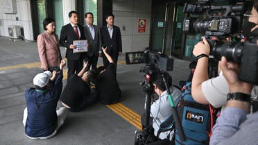Park Dae-chul (2nd L), lawmaker from South Korea's ruling People Power Party, speaks to the media among the party lawmakers as his party files a complaint accusing MBC TV with the prosecution at the Supreme Prosecutors' Office in Seoul on September 29, 2022. (AFP)