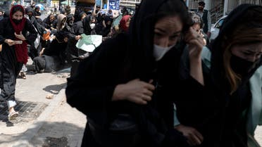 Taliban fighters fire into the air to disperse Afghan women protesters in Kabul on August 13, 2022. (File photo: AFP)
