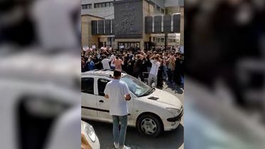 This grab taken from a UGC video posted online on October 1, 2022 shows Iranian students protesting outside a university in Tehran, against an ongoing crackdown on dissent over the death last month of Mahsa Amini in the custody of Iran notorious morality police. (AFP)