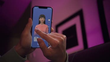 An undated handout image from U.S. startup Replika shows a user interacting with a smartphone app to customize an avatar for a personal artificial intelligence chatbot, known as a Replika, in San Francisco, California, U.S.