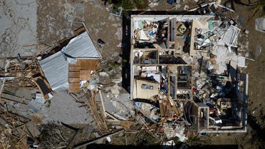 An aerial picture taken on October 3, 2022 shows a destroyed house in the aftermath of Hurricane Ian in West Inland, Matlacha, Florida. (AFP)