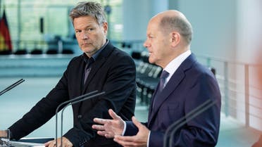 German Minister of Economics and Climate Protection Robert Habeck (L) and German Chancellor Olaf Scholz address a press conference on September 16, 2022 at the Chancellery in Berlin. (AFP)