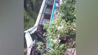At least 25 people killed in India after wedding bus falls into gorge 