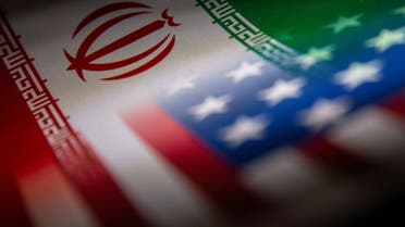 Iran's and US' flags are seen printed on paper in this illustration taken January 27, 2022. (Reuters)