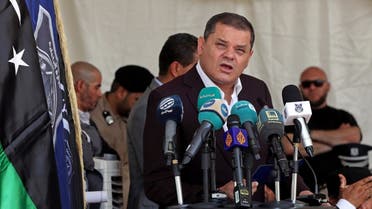 Libya’s interim prime minister Abdulhamid Dbeibah speaks during a military graduation ceremony in the capital Tripoli on July 3, 2022. (AFP)