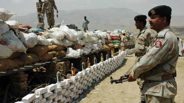Pakistani soldiers prepare to destroy narcotics in Quetta June 28, 2006. Pakistani authorities destroyed 3,010 kilograms of hashish, 376 kilograms of heroin and 15,799 kilograms of morphine on Wednesday, a government handout said. (Reuters)
